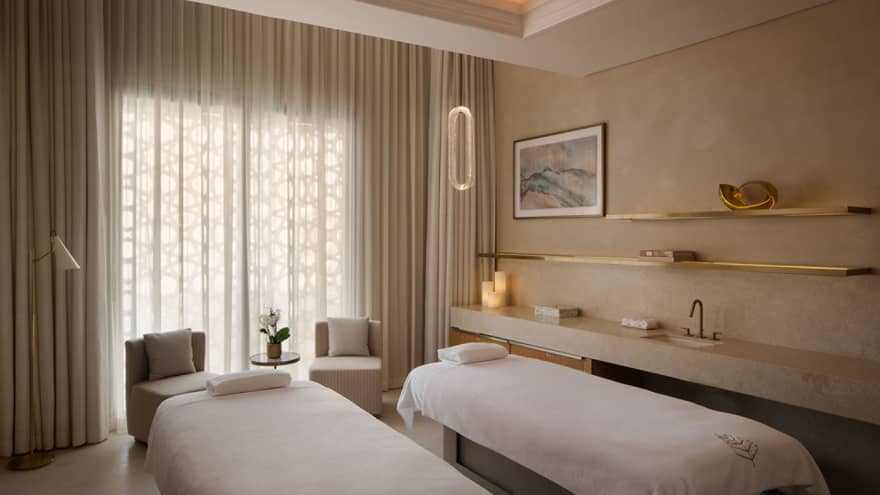 Spa treatment room with two treatment tables