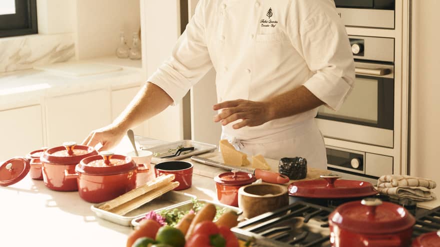 Chef preparing a meal in a kitchen