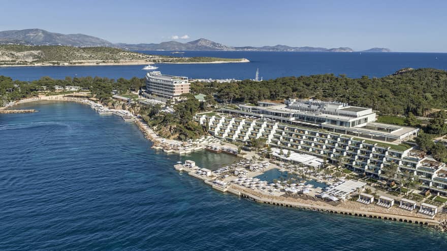 Sweeping aerial view of Four Seasons Astir Palace Hotel Athens along waterfront