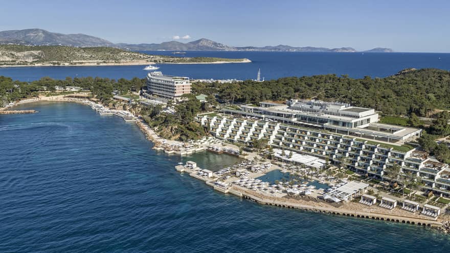 Sweeping aerial view of Four Seasons Astir Palace Hotel Athens along waterfront