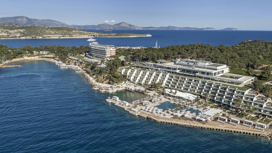 Sweeping aerial view of Four Seasons Astir Palace Hotel Athens along waterfront