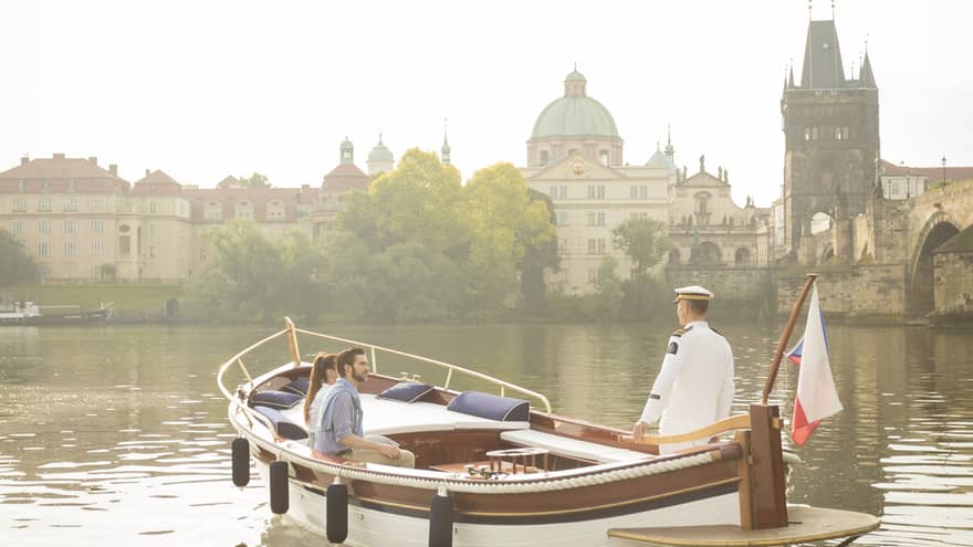 Couple enjoying river boat trip in Prague