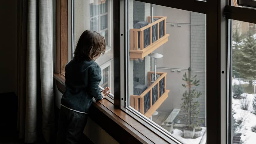 Boy looking out the window
