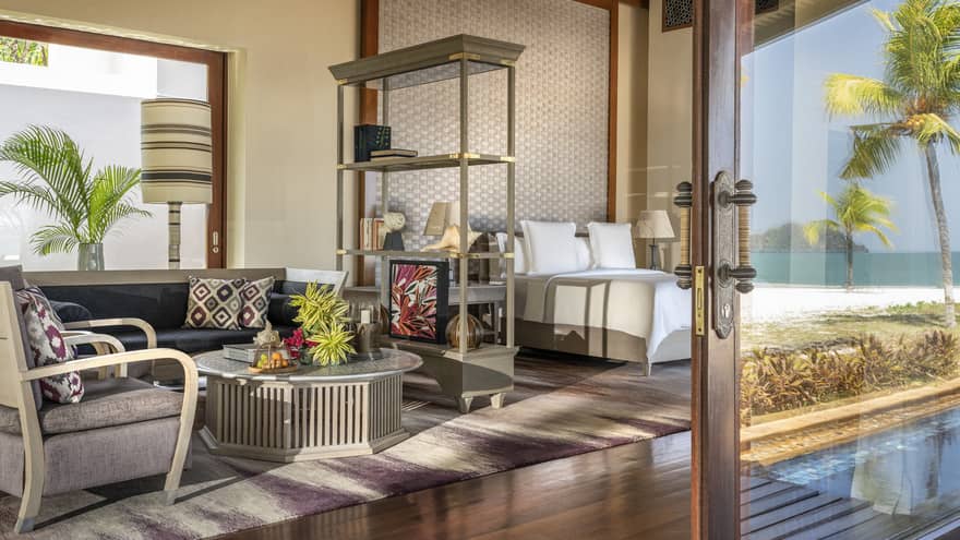 Studio with king bed and living room area