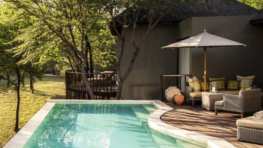 Two-bedroom villa plunge pool, curved patio with umbrella