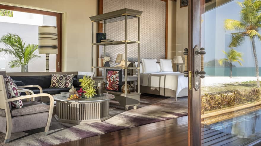 Studio with king bed and living room area