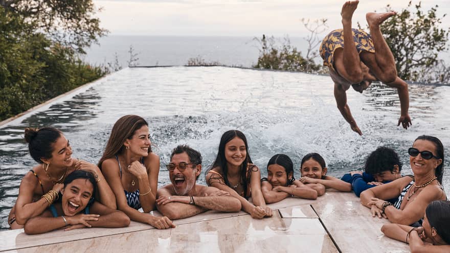 Family having fun in the pool
