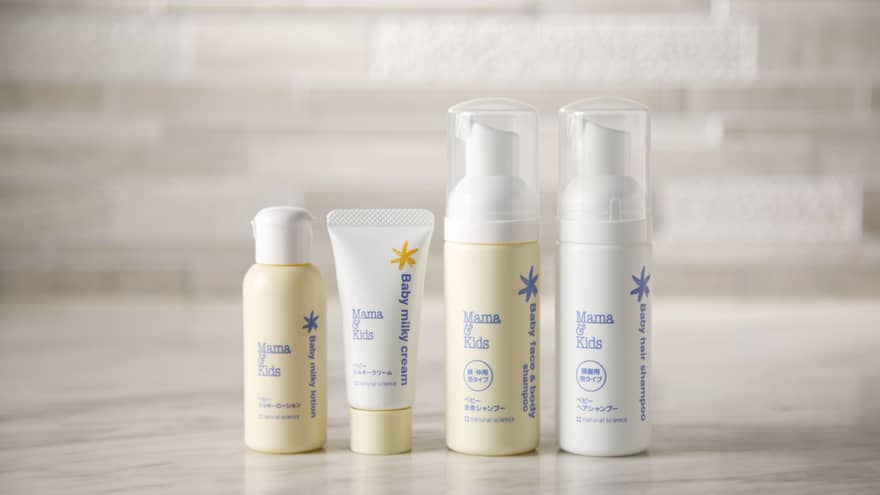 Row of travel-size bottles from Mama 