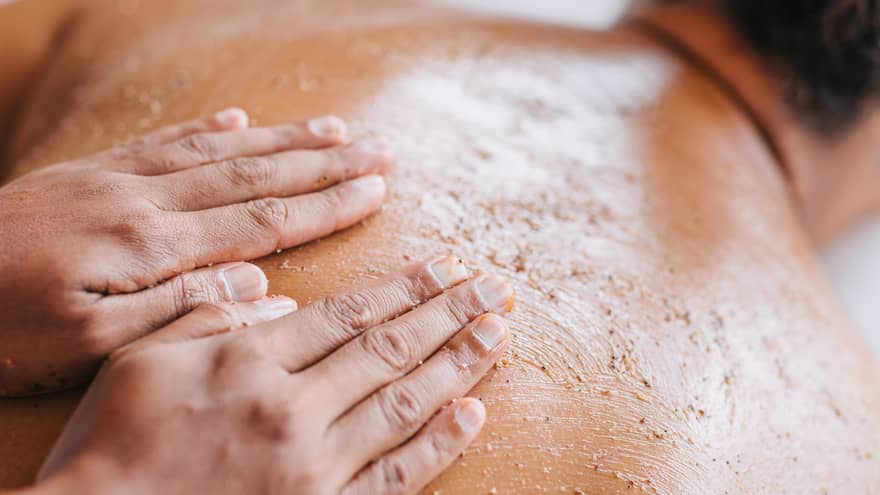 A massage using a rough scrub.