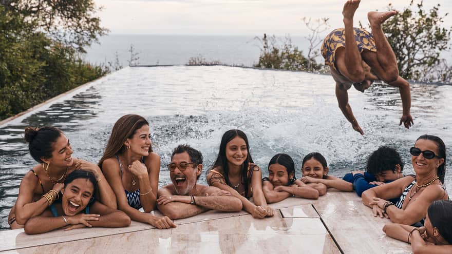 Family having fun in the pool