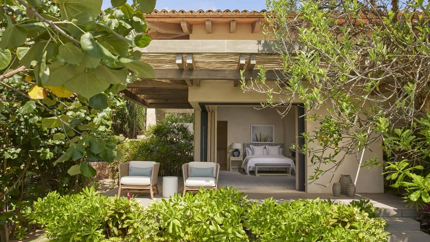 Private villa outdoor entrance into a bedroom, with a garden terrace