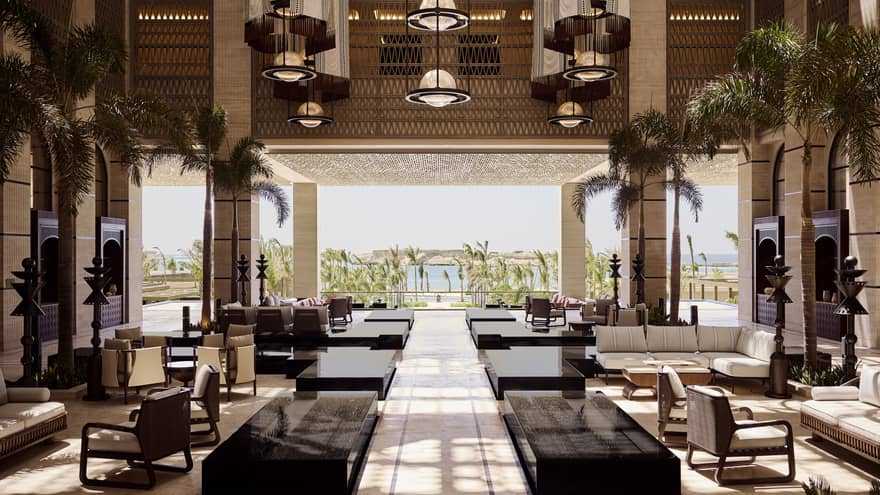 Luxury resort lobby open to the sea-view pool terrace