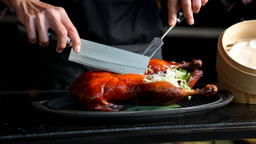 Peking duck being cut tableside