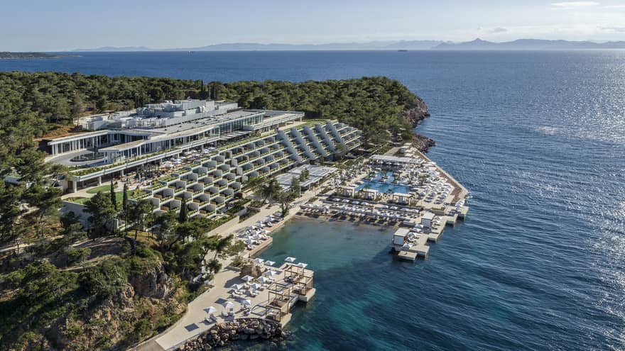Aerial view over Athens Four Seasons Hotel and Resort buildings and water