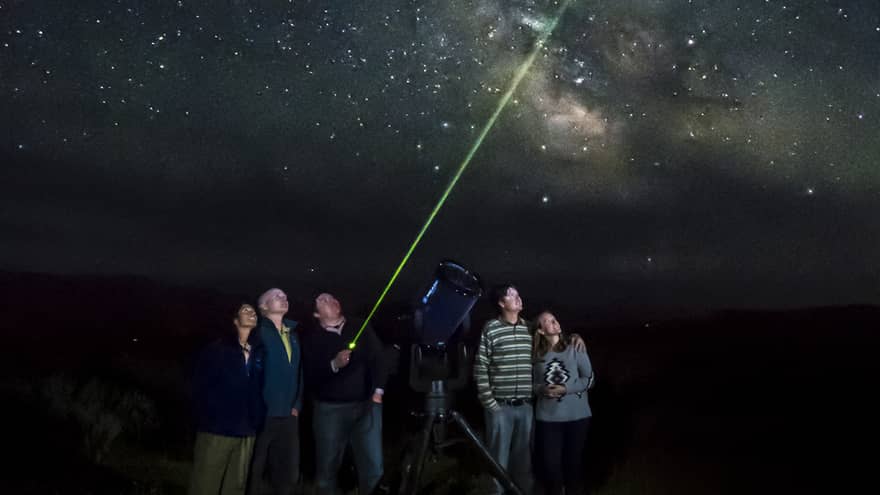 guests stargazing together