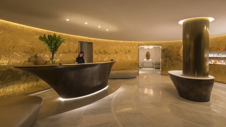 Lobby at the Spa with gold walls and modern details