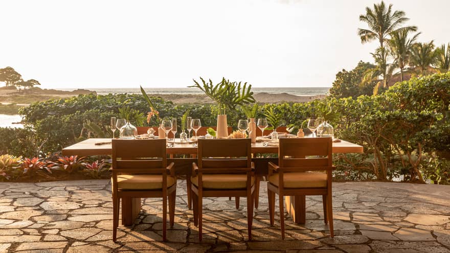 Outdoor dining table for six set near Hawaiian beach