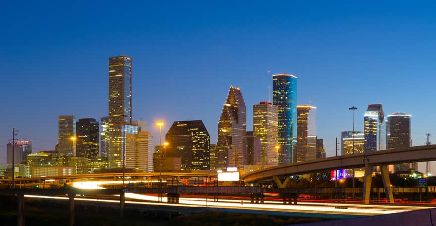 Houston city skyline, highway at night