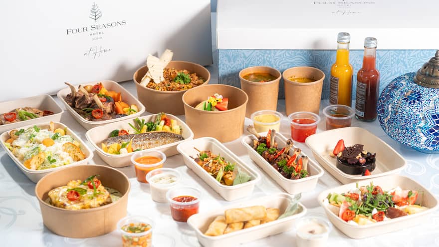 Display of a full Ramadan feast in to-go containers