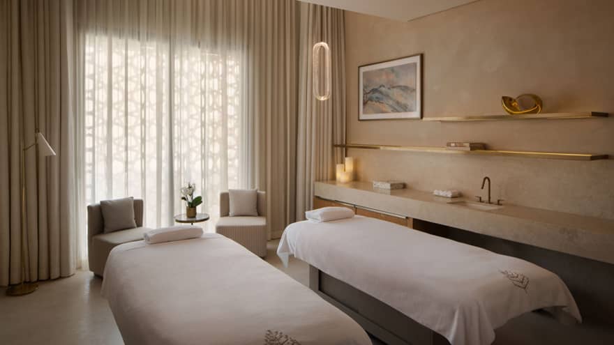 Spa treatment room with two treatment tables