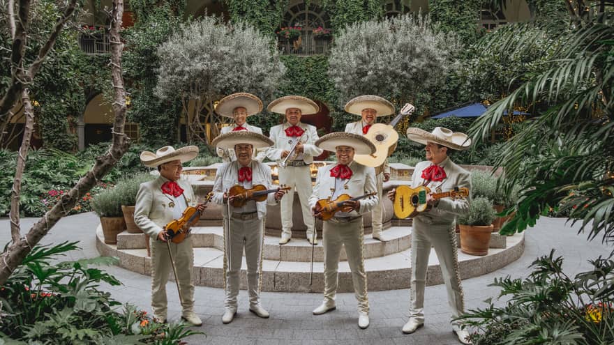Mariachi band playing in a luxury hotel courtyard
