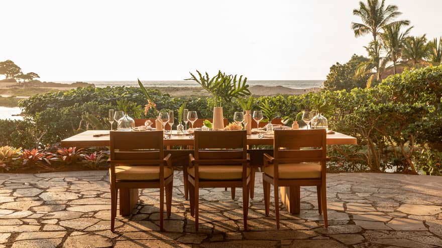 Outdoor dining table for six set near Hawaiian beach