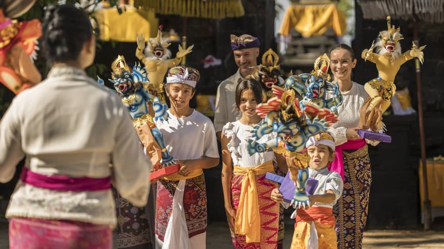 Family of five participates in cultural parade