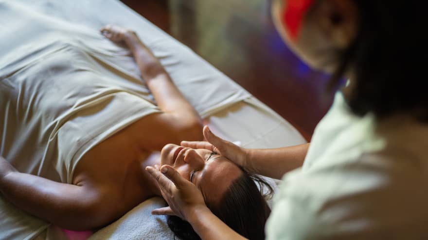 Female guest enjoys a facial at Te Mahana Spa