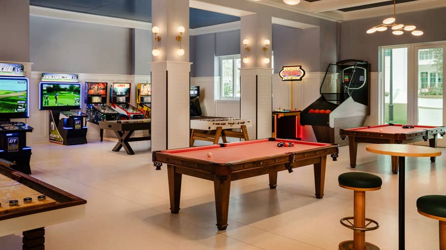 Game room with pool tables and arcade games