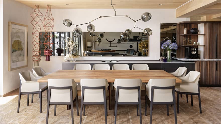 A large dining table in a well lit room.