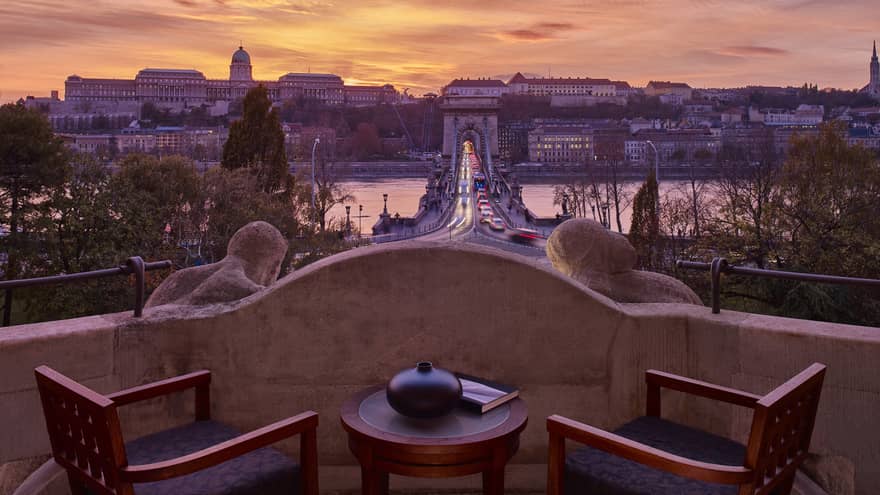 Royal Suite stone balcony with Danube River and Budapest view at sunset