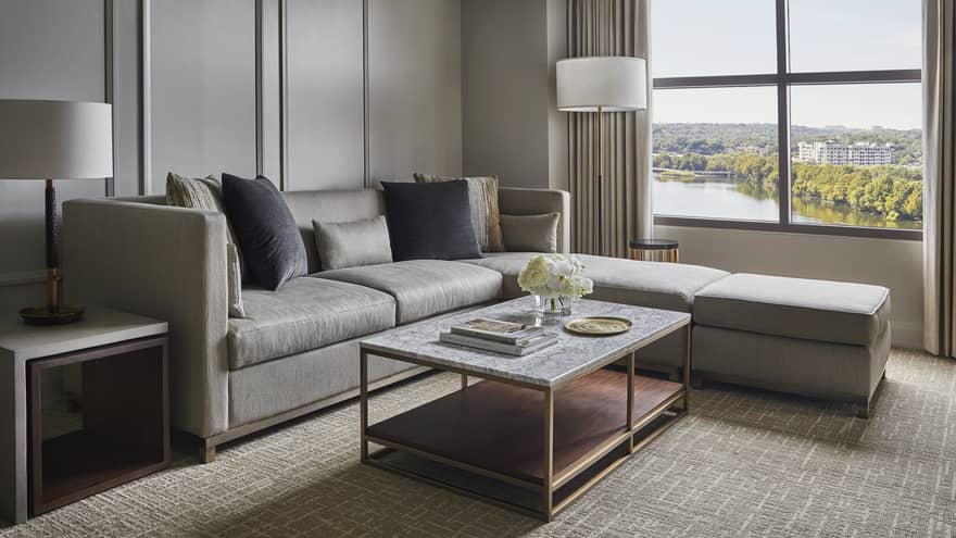 Living room with sectional sofa and Austin lake view