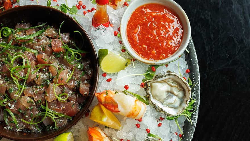 Raw seafood platter on ice