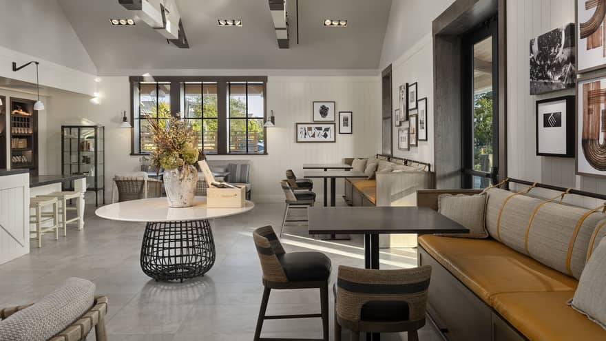 A large room with many seats and an eclectic style.