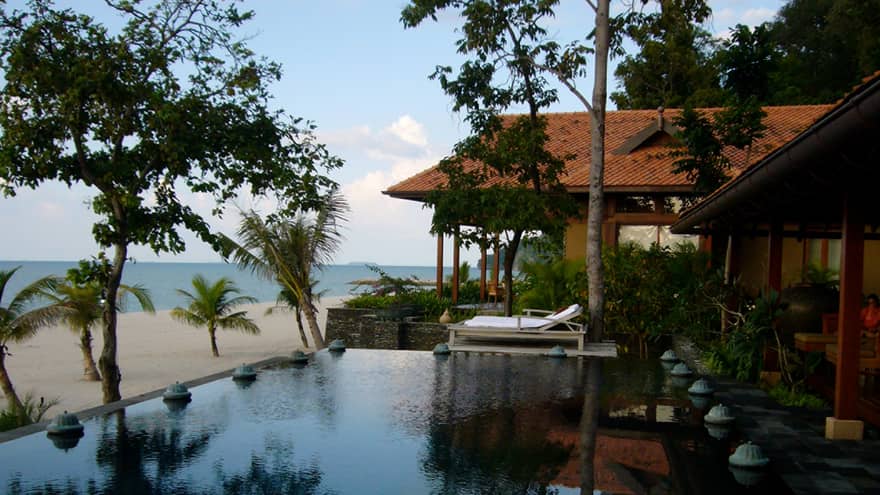 Royal Beach Villa deck, plunge pool beside white sand beach