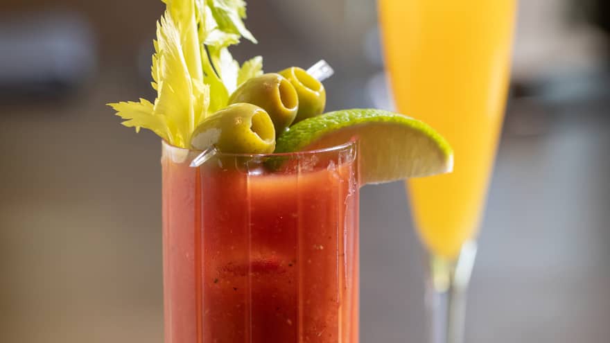 A red and orange cocktail.