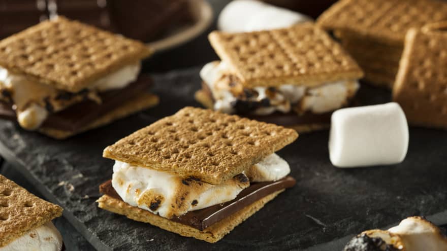 smores graham cracker sandwiches with marshmallows, chocolates