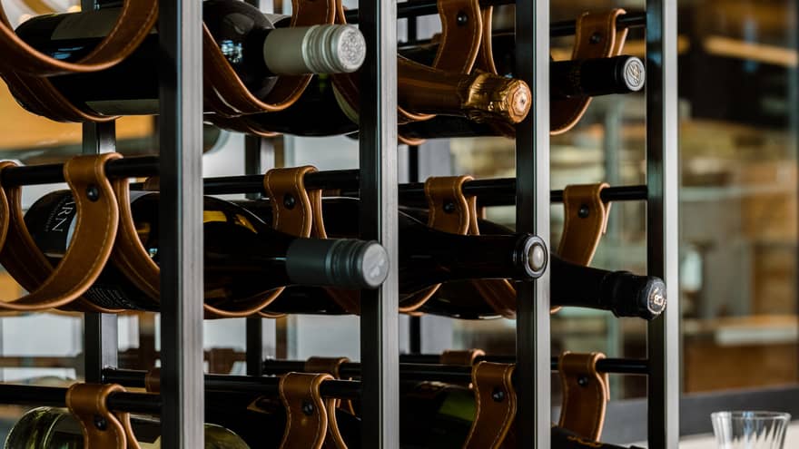 Racks of wine stacked on each other.