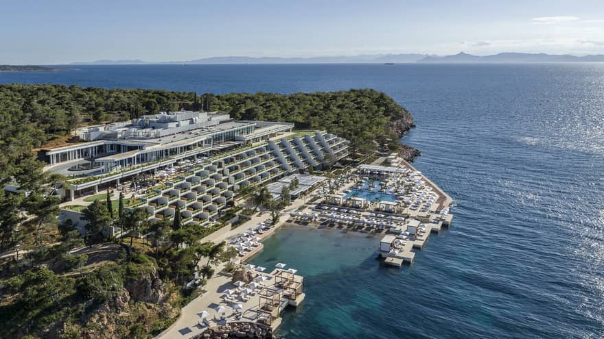 Aerial view over Athens Four Seasons Hotel and Resort buildings and water