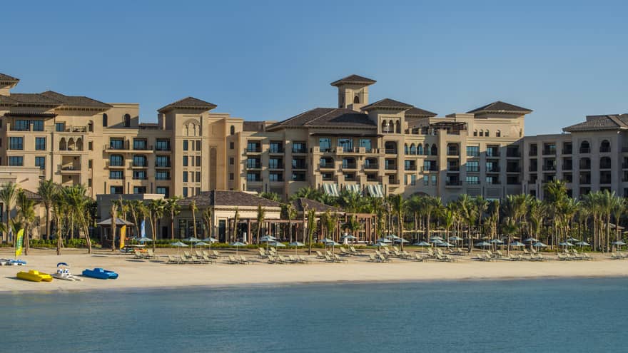Exterior view of building, sand beach at Four Seasons Resort Dubai at Jumeirah Beach