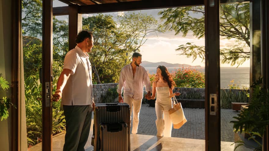 Man and woman being greeted upon arrival