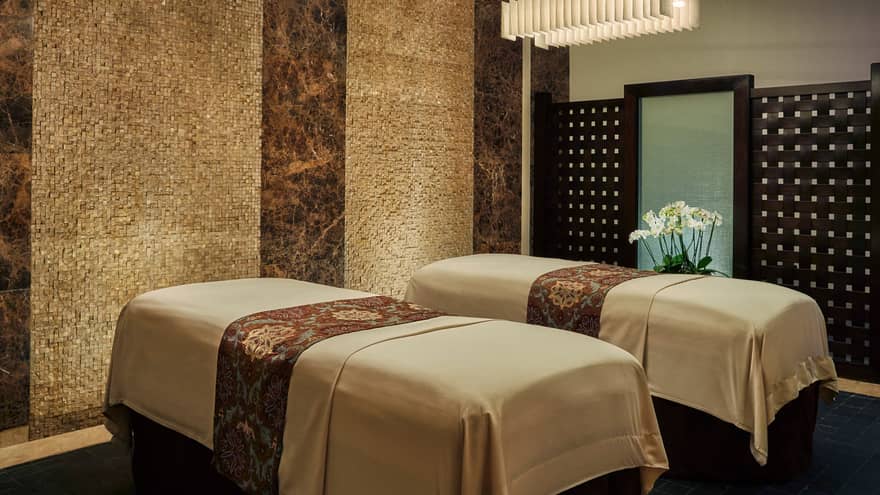 Couples massage beds side-by-side in spa