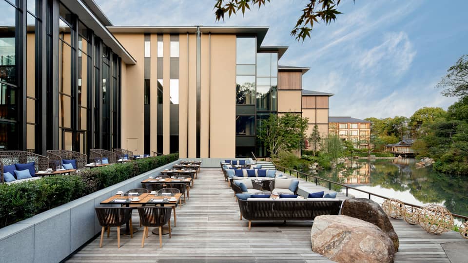 Tables, chairs and large rock on Brasserie Terrace