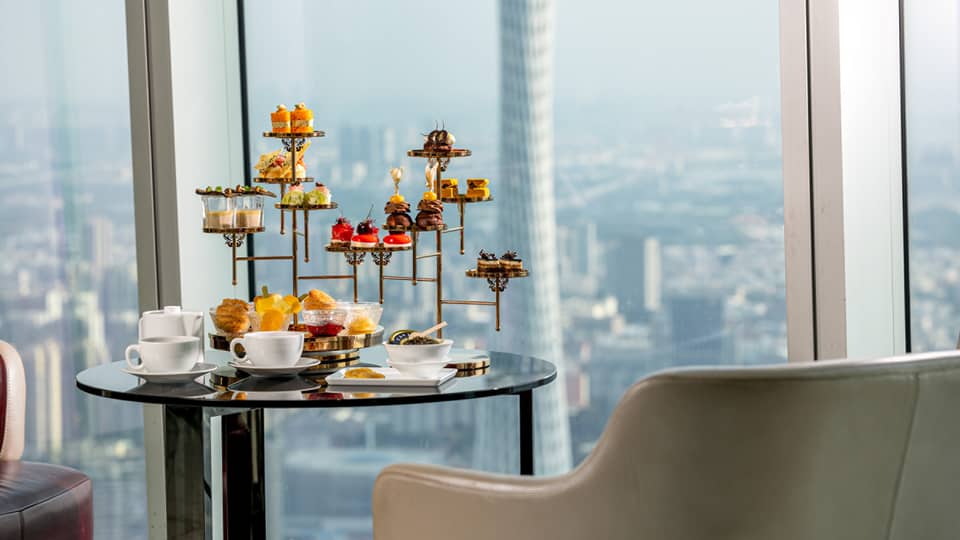 Afternoon Tea sweets tower at the Atrium with views of downtown Guangzhou