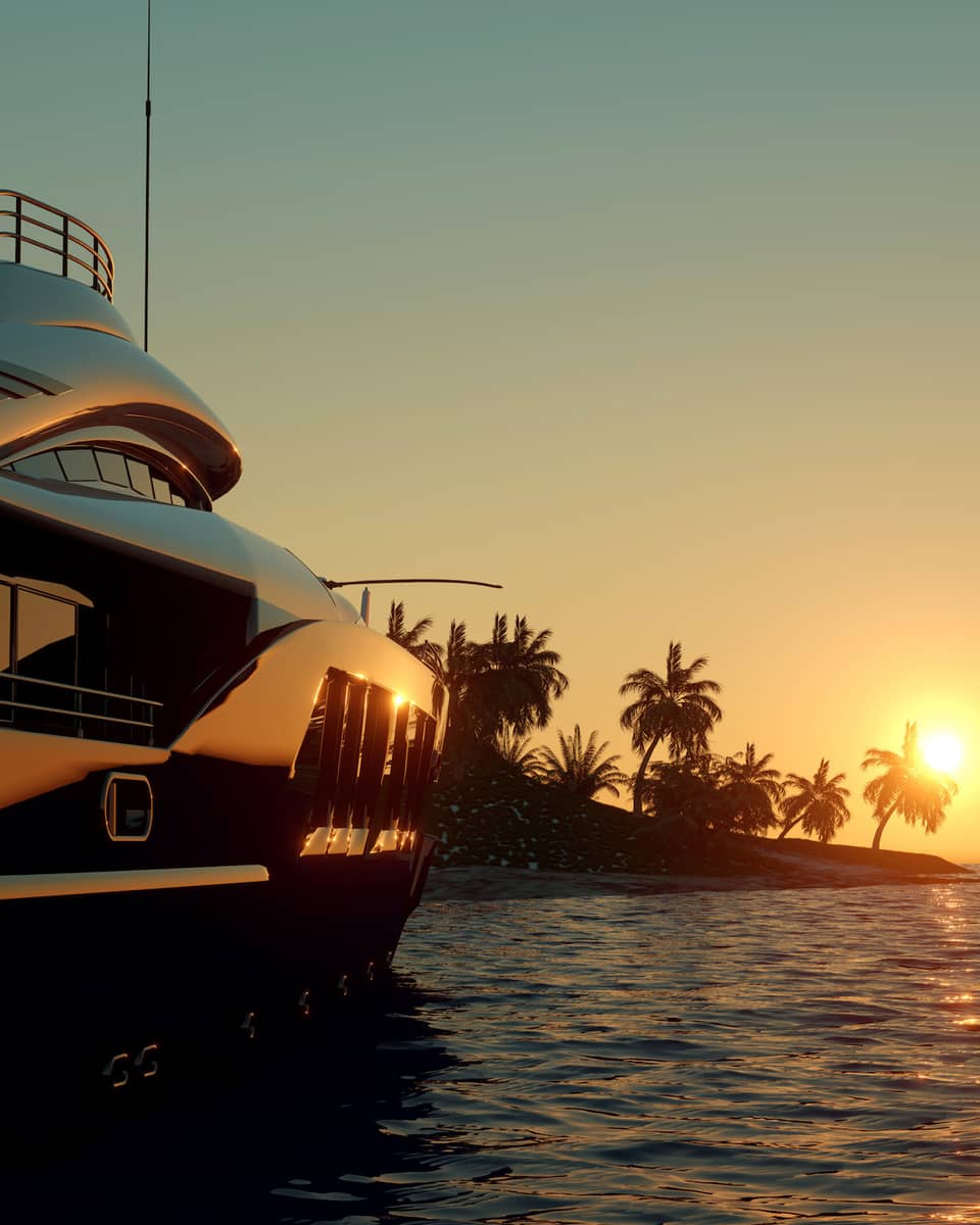 A boat cruises on clear waters at sunset