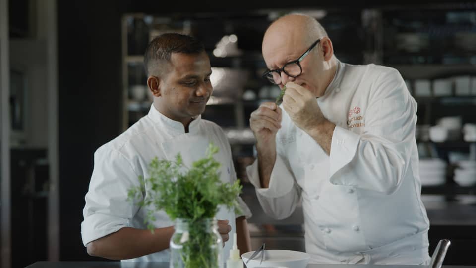 Chef Gaetano Trovato and his apprentice in the kitchen at Blu Beach Club