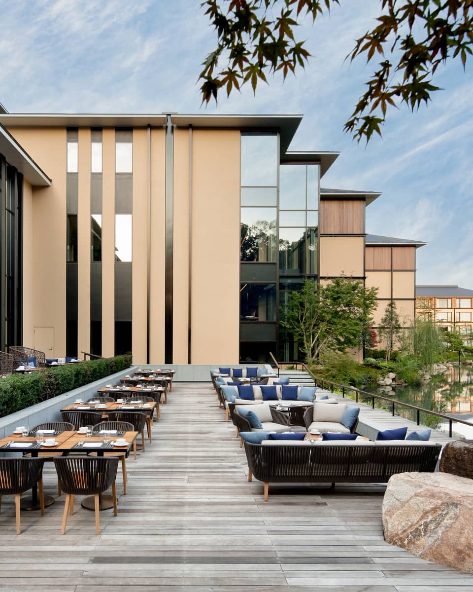 Tables, chairs and large rock on Brasserie Terrace