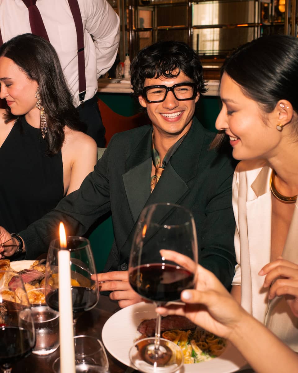 Group of friends dine at chic restaurant