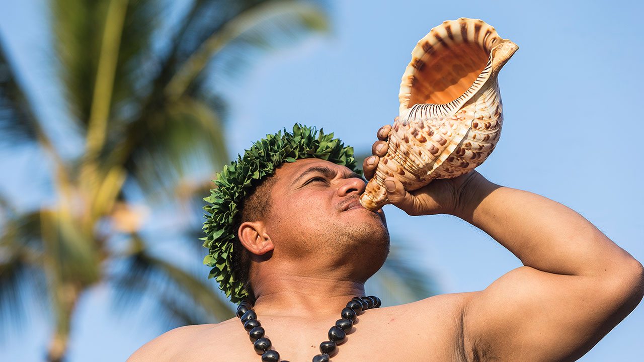 Conch Blowing at Four Seasons Lanai