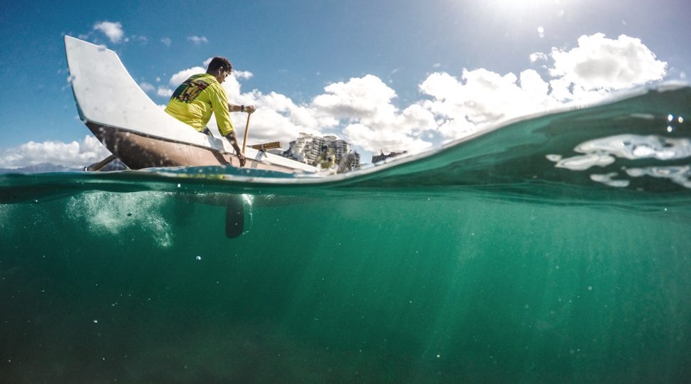 Canoe above and under the water